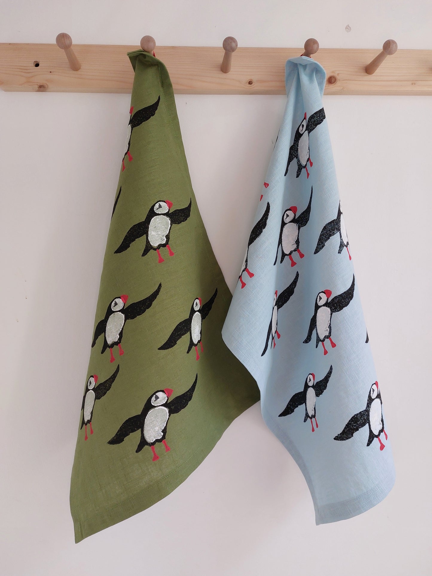 plucky puffin tea towel avocado