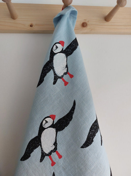 plucky puffin tea towel pale blue