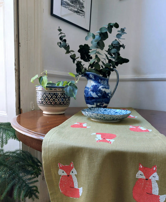 table runner crafty fox on avocado linen