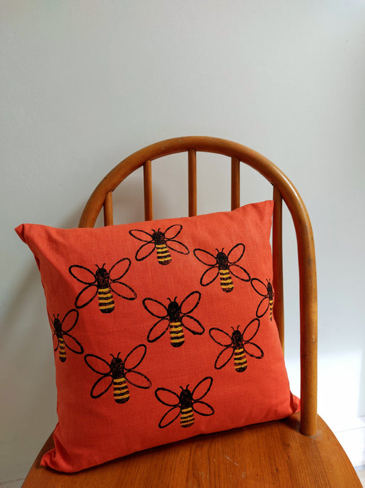 busy bees on marmalade cushion