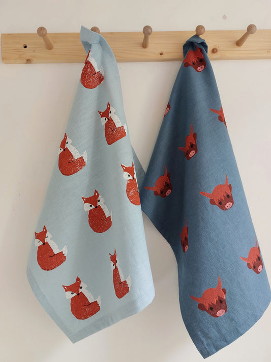 crafty fox tea towel light blue
