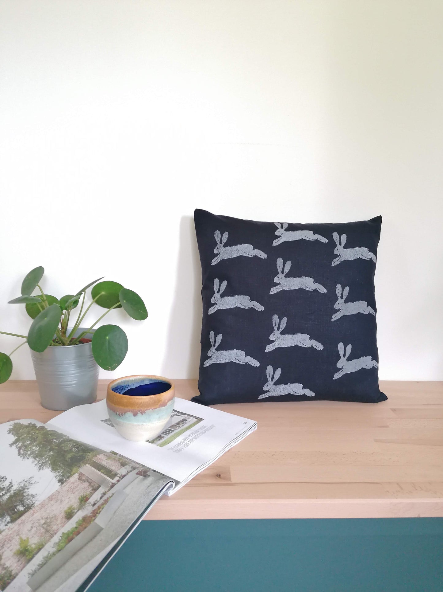 leaping hare cushion navy
